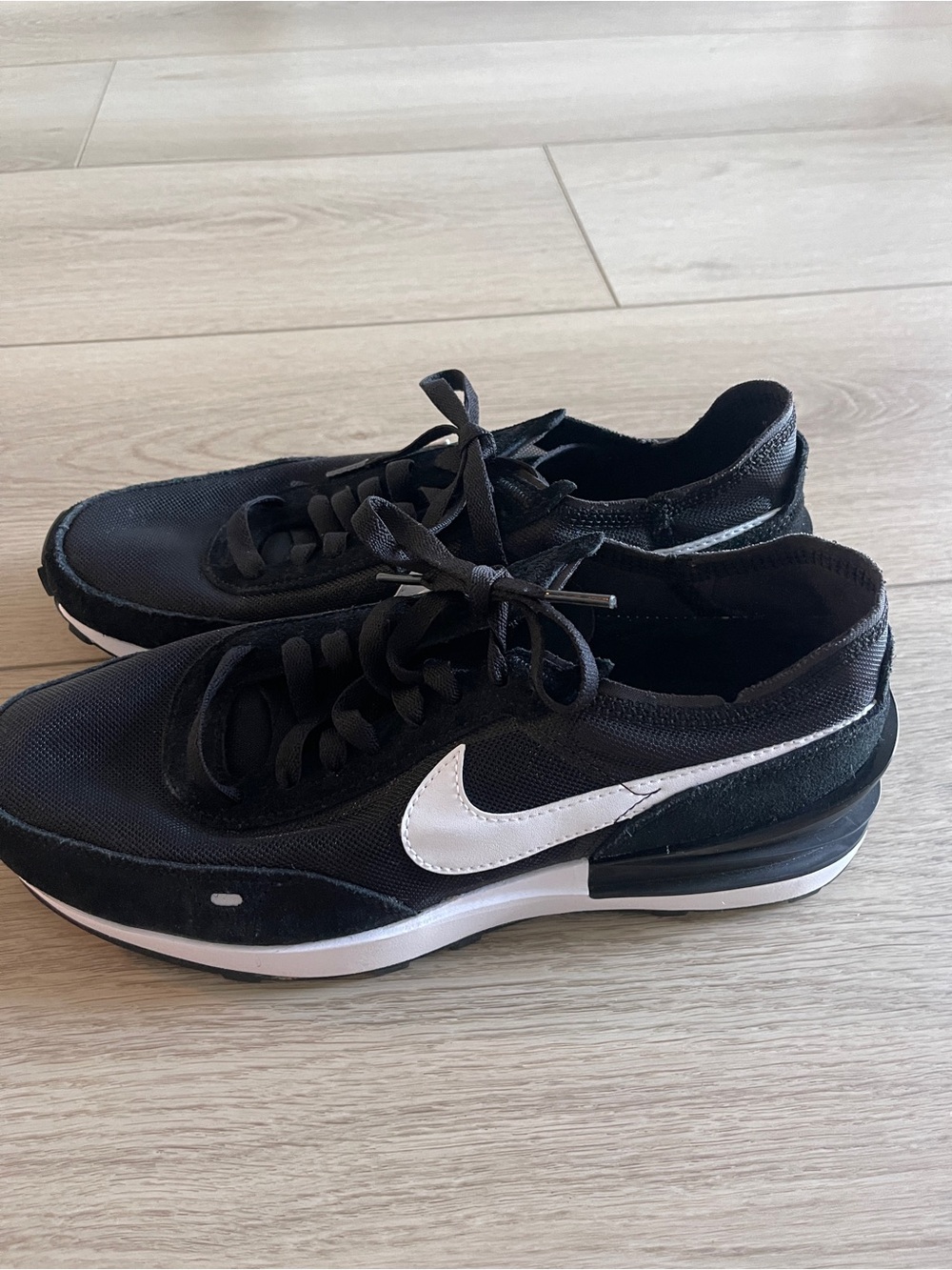 Nike Black Sneakers with White Swoosh